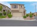 Charming two-story home with desert landscaping and an attached two-car garage at 10630 Lunar Crest Ave, Las Vegas, NV 89129