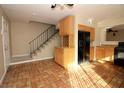 Open kitchen with access to the stairs at 1467 Hialeah Dr # C, Las Vegas, NV 89119