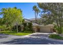 Beautiful single Gathering home with well-maintained landscaping and a spacious three-car garage at 2008 Winter Wind St, Las Vegas, NV 89134
