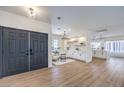 Inviting entryway featuring double doors, modern lighting, and an open floor plan at 2581 Terrytown Ave, Henderson, NV 89052