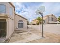 Spacious backyard patio with a basketball hoop, perfect for outdoor activities and entertainment at 271 Sunshine Springs Ct, Henderson, NV 89014