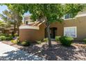 Charming condo entrance with lush landscaping and a welcoming facade at 8070 W Russell Rd # 2121, Las Vegas, NV 89113