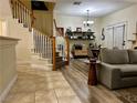 Inviting living room with wood floors, neutral colors, and lots of natural light at 9133 Forest Willow Ave # 102, Las Vegas, NV 89149