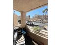 Cozy balcony area overlooking the parking area and other community buildings at 2171 Bay Club Dr # 103, Laughlin, NV 89029