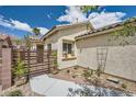 Inviting home exterior showing the walkway, desert landscaping, and a private courtyard at 3257 River Glorious Ln, Las Vegas, NV 89135