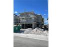 New home under construction with scaffolding in place, showing the building progress at 4208 Mount Bonnell Ave, North Las Vegas, NV 89081