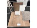Interior design samples of flooring, carpet, cabinets, quartz and paint for a new home at 4208 Mount Bonnell Ave, North Las Vegas, NV 89081