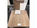 Interior design samples of flooring, carpet, cabinets, quartz and paint for a new home at 4208 Mount Bonnell Ave, North Las Vegas, NV 89081