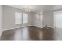 Spacious living room with laminate floors, neutral color, and natural light at 776 Anacapri St, Las Vegas, NV 89138