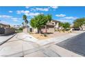 A two-story home with a three-car garage and desert landscaping at 1291 Rolling Sunset St, Henderson, NV 89052