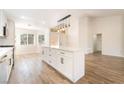 Open-concept kitchen features a center island, stainless steel appliances, and lots of light at 2505 Showcase Dr, Las Vegas, NV 89134