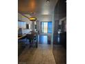 Modern kitchenette featuring stainless steel appliances and a sleek design, steps away from bedroom and views at 4381 W Flamingo Rd # 3109, Las Vegas, NV 89103