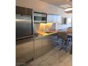 Stylish kitchenette featuring stainless steel appliances and modern design, perfect for compact cooking needs at 4381 W Flamingo Rd # 3109, Las Vegas, NV 89103