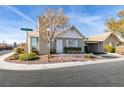 Inviting single-story home with neat landscaping and convenient covered parking area at 709 Jonathan Glen Way, Las Vegas, NV 89145
