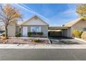 Charming single-story home with covered parking and well-maintained landscaping at 709 Jonathan Glen Way, Las Vegas, NV 89145