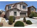 Charming home featuring desert landscaping and a two-car garage at 7246 Spring Flower Ave, Las Vegas, NV 89117