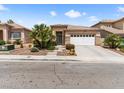 Inviting single-story home with desert landscaping and a spacious driveway at 7892 Nookfield Dr, Las Vegas, NV 89147