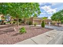 Inviting single-story home with a well-maintained front yard and desert landscaping at 8901 Litchfield Ave, Las Vegas, NV 89134