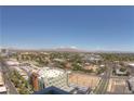 Wide aerial shot of a city neighborhood with mountains in the distance, showcasing the urban landscape at 900 Las Vegas Blvd # 1113, Las Vegas, NV 89101