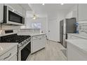 Well-lit kitchen with stainless steel appliances, white cabinets and countertops, and gas range at 9000 Las Vegas Blvd # 1004, Las Vegas, NV 89123