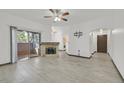 Bright living room with fireplace, sliding glass doors to balcony, and tile floors at 9000 Las Vegas Blvd # 1004, Las Vegas, NV 89123