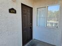 Image of the front door of the home with a visible house number at 2615 W Gary Ave # 1085, Las Vegas, NV 89123