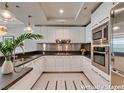 Modern kitchen with stainless steel appliances, sleek white cabinetry, and ample counter space at 2700 Las Vegas Blvd # 505, Las Vegas, NV 89109