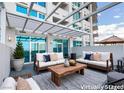 Relax on this covered outdoor patio with comfortable seating, perfect for entertaining guests at 2700 Las Vegas Blvd # 505, Las Vegas, NV 89109