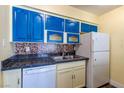 Functional kitchen boasts ample cabinet space, modern appliances, and a clean, efficient layout at 3062 El Camino Ave, Las Vegas, NV 89102