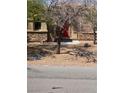 House with stone veneer and red front door at 3910 Internet Ave, North Las Vegas, NV 89031