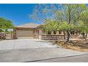 Beautiful single-story home with stone detailing, a spacious driveway, and an attached two-car garage at 3910 Internet Ave, North Las Vegas, NV 89031