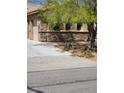 Exterior view showing stonework, landscaping and pedestrian access at 3910 Internet Ave, North Las Vegas, NV 89031
