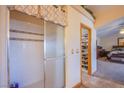 En suite bathroom with glass shower, walk in closet and bedroom with vaulted ceilings at 5180 N Dapple Gray Rd, Las Vegas, NV 89149