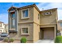Charming two-story home with desert landscaping and attached one car garage at 5228 Fire Night Ave, Las Vegas, NV 89122