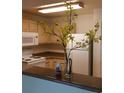 Eat-in kitchen with white appliances at 555 E Silverado Ranch Blvd # 2028, Las Vegas, NV 89183
