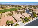 Aerial view of golf course community highlighting the property's location and desert landscaping at 10372 Premia Pl, Las Vegas, NV 89135