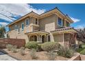 This well-maintained home features desert landscaping and a covered entryway, perfect for a welcoming first impression at 1113 Via Della Costrella, Henderson, NV 89011