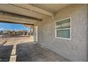 View of a covered parking area or carport leading to the home's entrance at 155 Magnesium St, Henderson, NV 89015