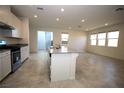 Kitchen with granite countertops, stainless steel appliances and tiled floors at 2970 Saltillo Ln, Las Vegas, NV 89121