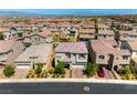 A beautiful home in a large community of single-Gathering homes with mature landscaping, tile roofs and wide streets at 3042 Echoed Rondel Ln, Henderson, NV 89044