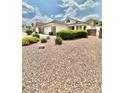Charming single story home with desert landscaping, front yard at 3329 Hidden Ridge St, Las Vegas, NV 89129