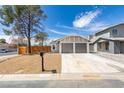 Charming home with a two-car garage and a low-maintenance front yard at 3800 Summer Breeze Cir, Las Vegas, NV 89108
