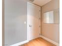 Entryway with hardwood floors, door, and mirror at 4471 Dean Martin Dr # 4001, Las Vegas, NV 89103