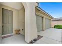 A welcoming front entrance, showcasing a covered porch with a small table at 4910 Cielo Ct, Pahrump, NV 89061