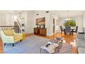 Spacious living room with hardwood floors, a zebra rug, and natural lighting at 5361 Cabrito Dr, Las Vegas, NV 89103