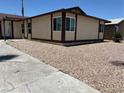 Well-maintained single-story home featuring desert landscaping and manicured lawn at 681 Pine Ridge Dr, Las Vegas, NV 89110