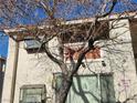 Exterior of building with tree in front of it on a sunny day at 7300 Pirates Cove Rd # 2045, Las Vegas, NV 89145