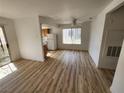 Spacious living room featuring wood floors and bright natural light at 7300 Pirates Cove Rd # 2045, Las Vegas, NV 89145
