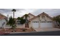 Charming single-story home featuring a two-car garage and well-maintained landscaping at 8052 Marbella Cir, Las Vegas, NV 89128