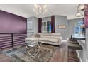 Cozy living room features a comfortable sectional, modern lighting, and stylish decor with open space at 9000 S Las Vegas Blvd # 2222, Las Vegas, NV 89123
